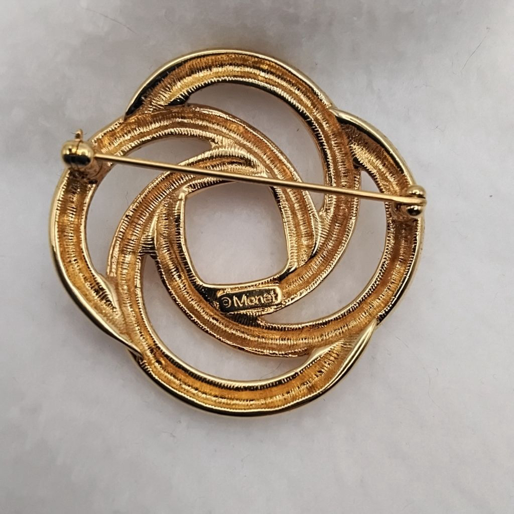 Vintage Monet Brooch | Goldtone Love Knot Pin | Signed Monet Circle Knot Brooch - Picture 3 of 4